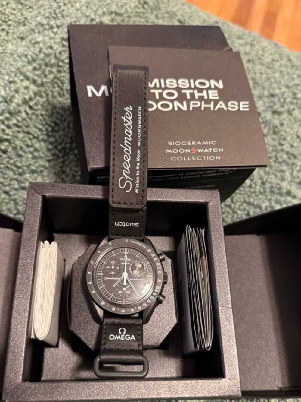 OMEGA x Swatch MISSION TO THE MOONPHASE NEW MOON–Black Bioceramic Snoopy Watch.